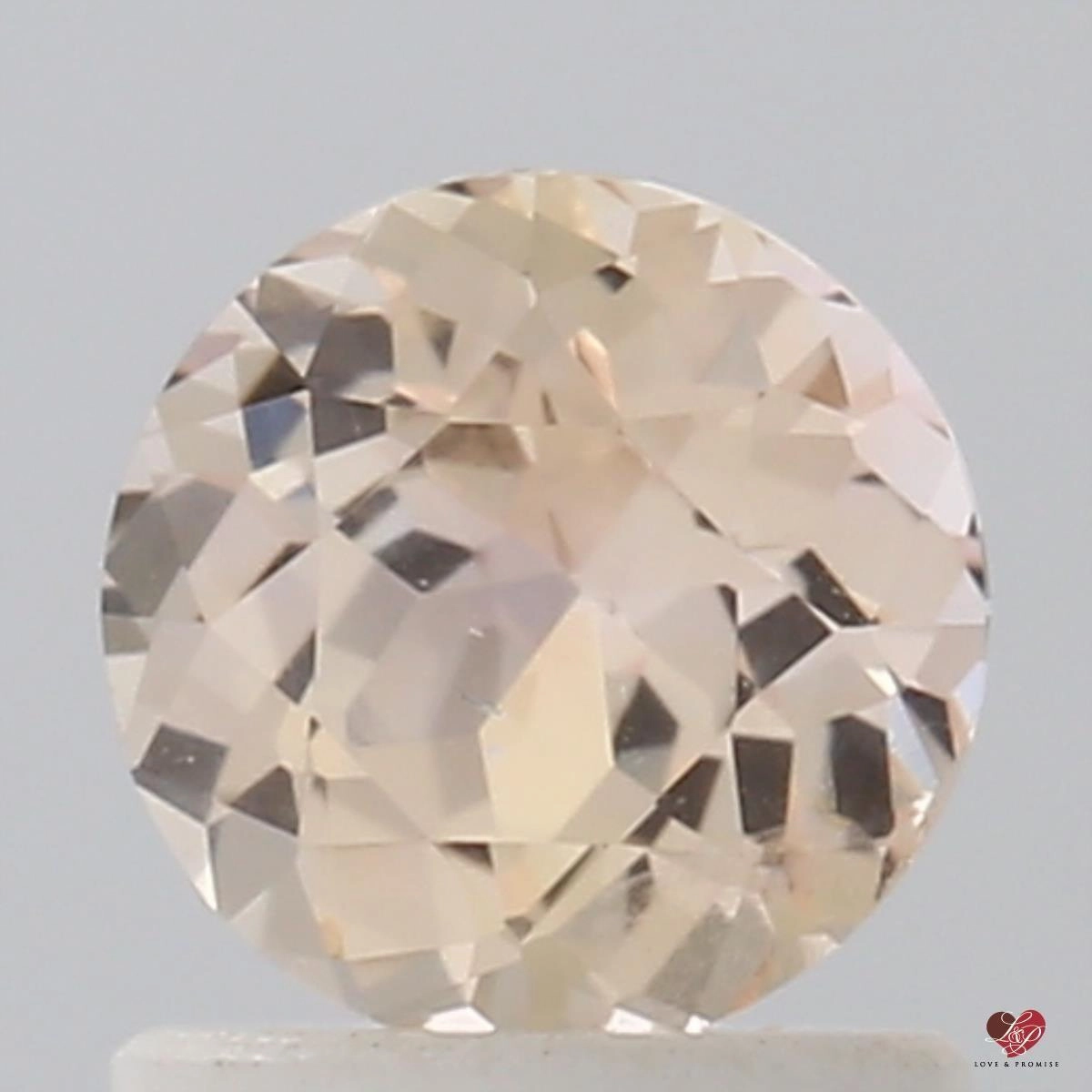 1.10cts Round Peach Blush Champagne Sapphire