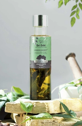 <strong>Crushed Tri-Leaf Rosemary Monsoon Hair Oil</strong> <br><i>Absolute Hairfall Control</i>