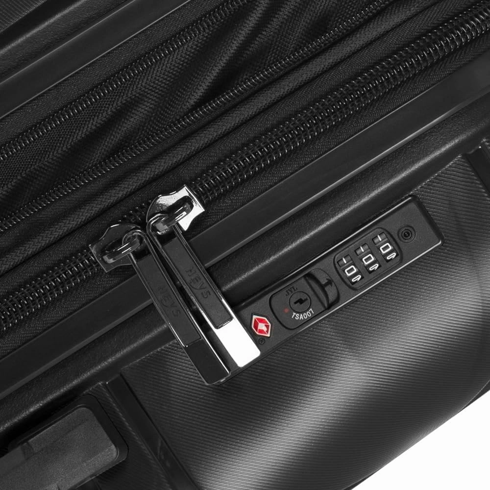 Heys Milos Durable and lightweight luggage, made with Duraflex impact-resistant material, TSA Combination Lock, Dual Spinner Wheels, and Expandable, Black, 26-Inch, Medium Check-In