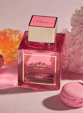 THE-Dubai-DOLLS Luxury Eau de Parfum – FLIRT | A vibrant blend of pink pepper, peony, and honey for a captivating scent, perfect for day and night. (100ml)